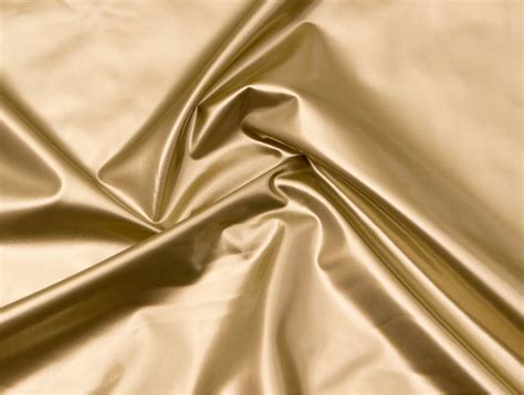 metallic gold vinyl fabric|white fabric with gold accents.